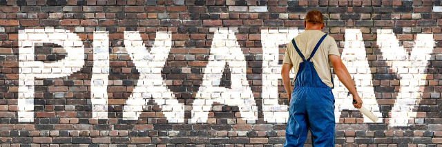 painter painting wall